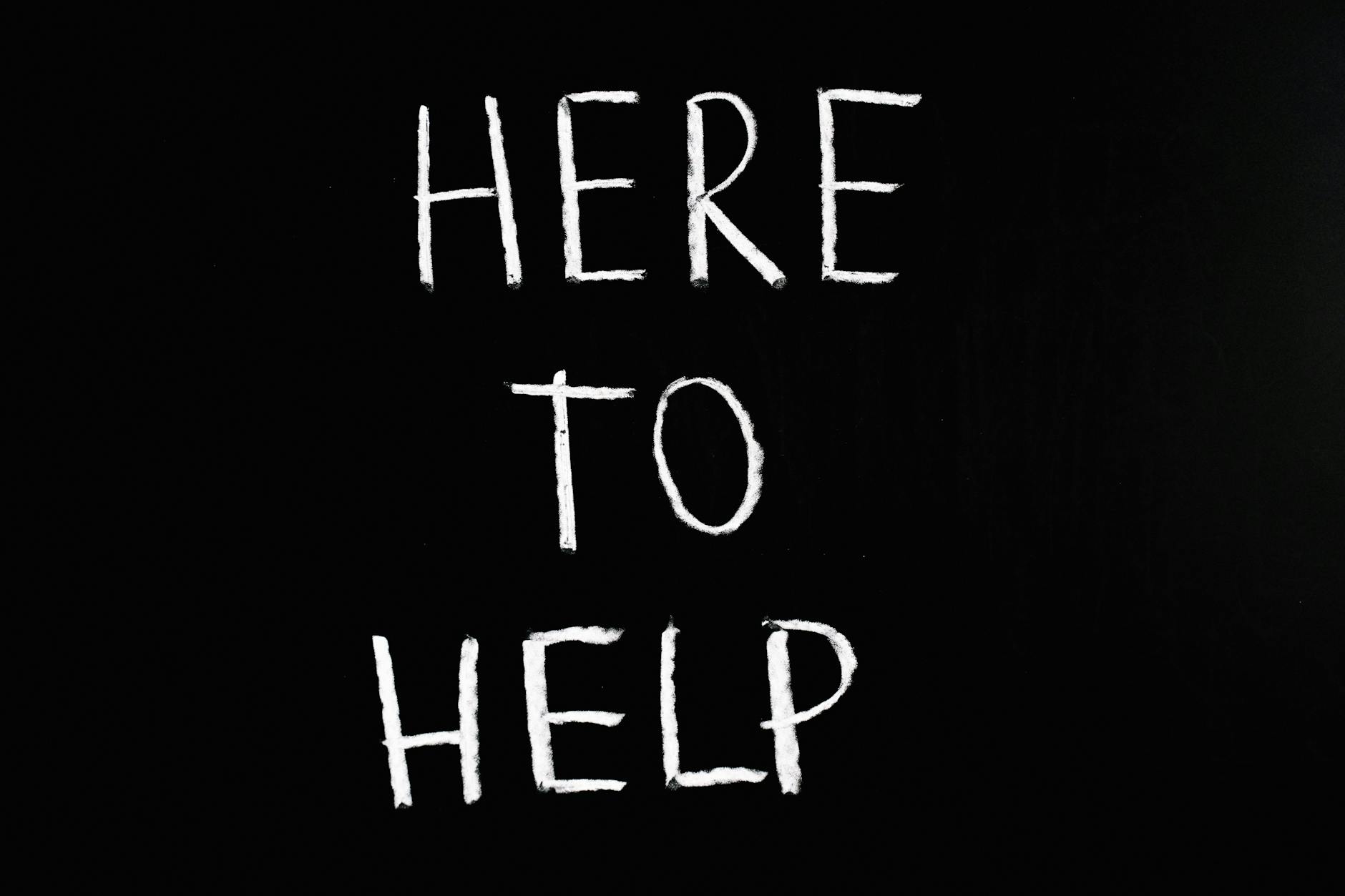 Blackboard with handwritten message in white chalk: "Here to Help"

Photo by Anna Tarazevich on Pexels.com